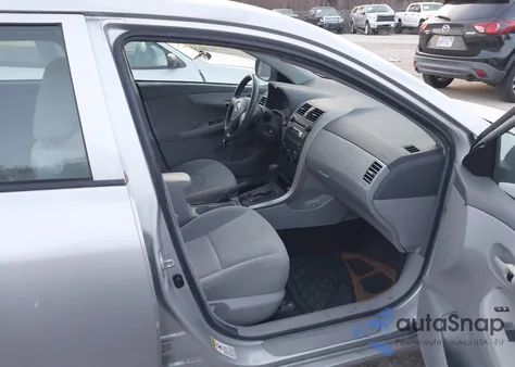 2009 Toyota Corolla Le from USA, damaged, VIN 1NXBU40E29Z080371